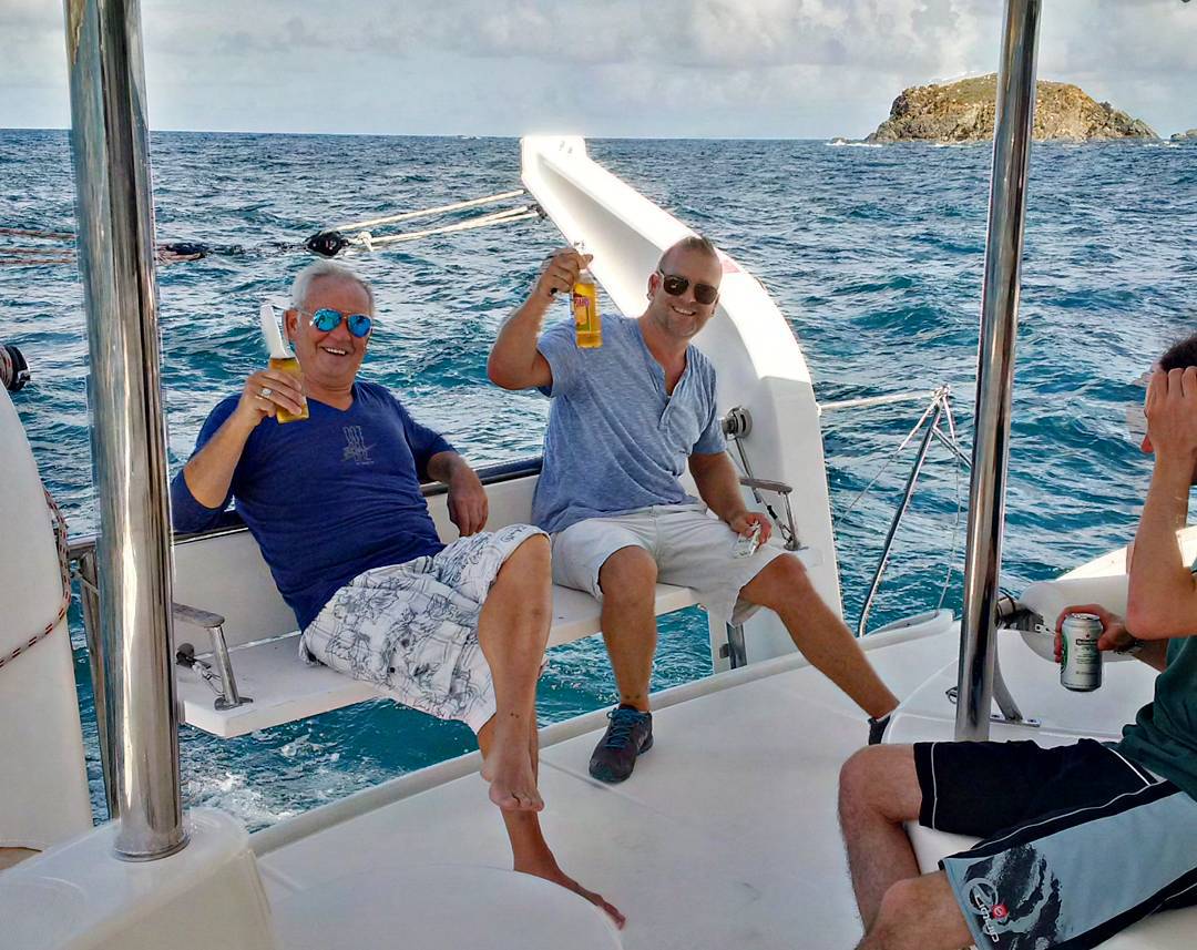 Our guests enjoying beverages during a recent sail. The large cockpit and benches on our 46' catamaran ensure comfort and safety, as well as making sure clients can enjoy the beautiful days we experience every day