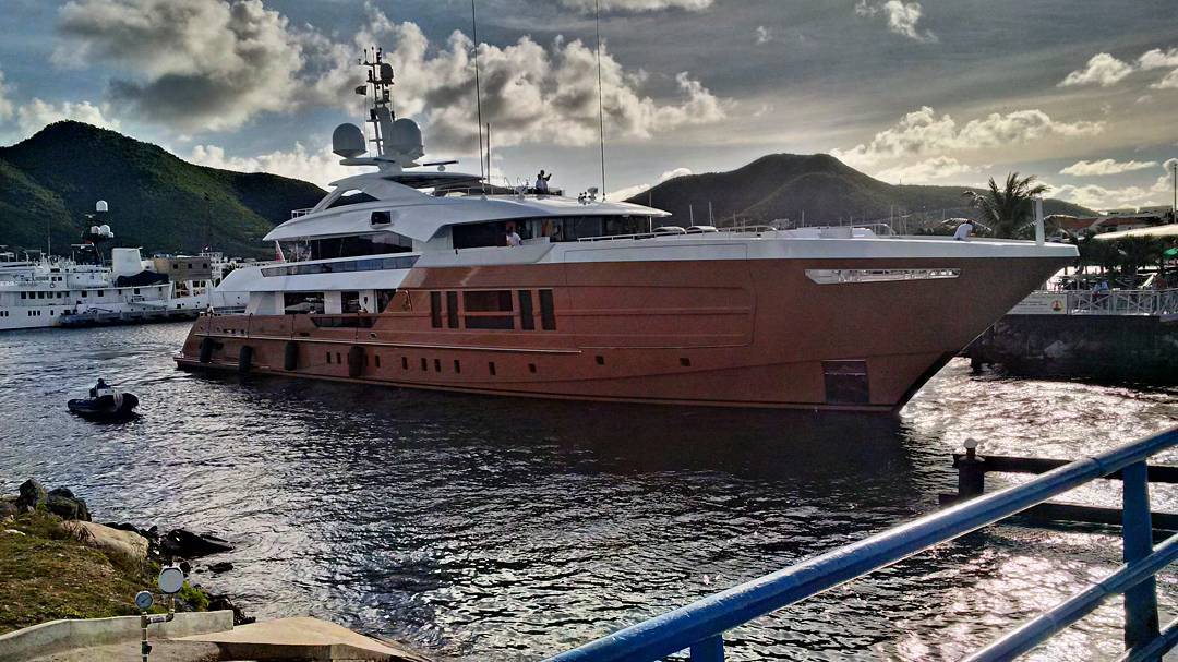 Mega Yacht navigating the Lagoon bridge on its way to sea. These things fit through by the smallest of margins!